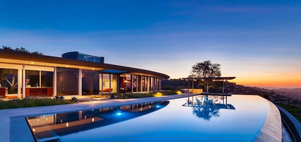 California home with infinity pool and large windows