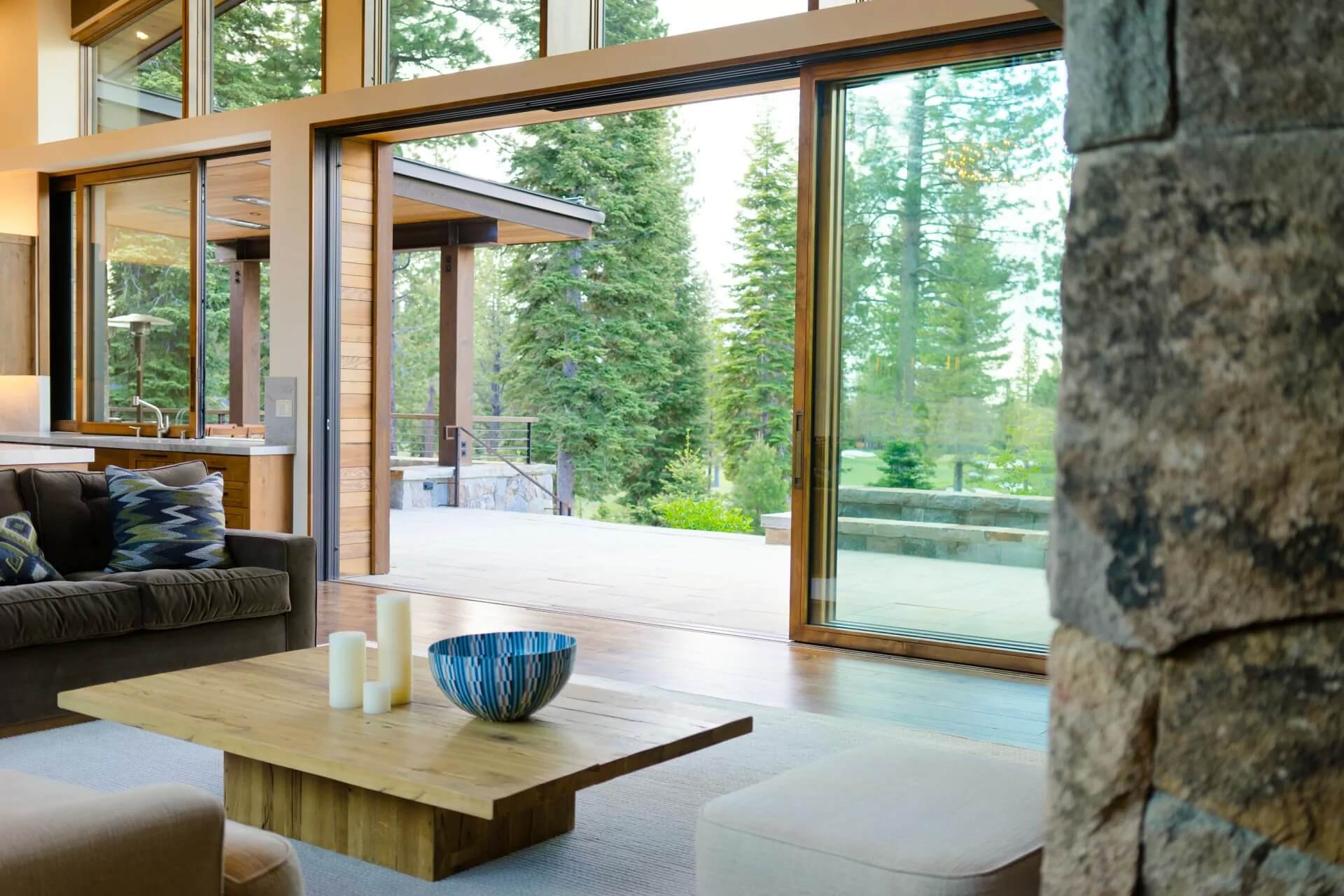 Living room with sliding door and windows